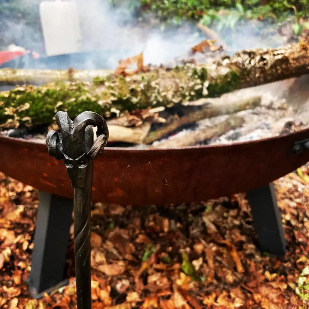 Smoke rising from the woodland campfire at The Primitive Huntsman weekend